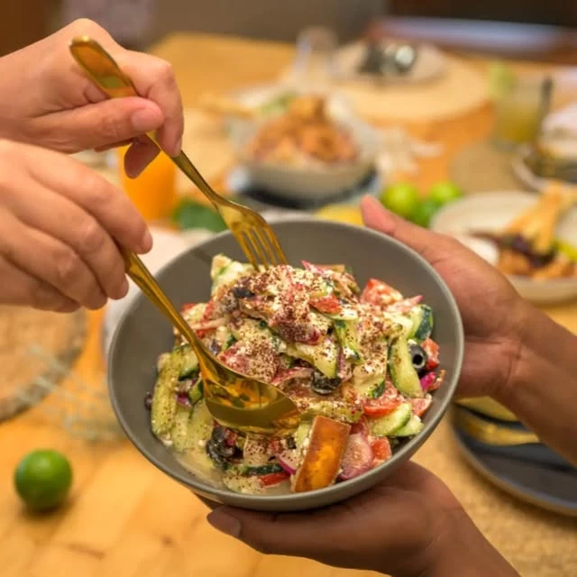 Fresh Yabalulu salad with avocado, tomatoes and cucumber